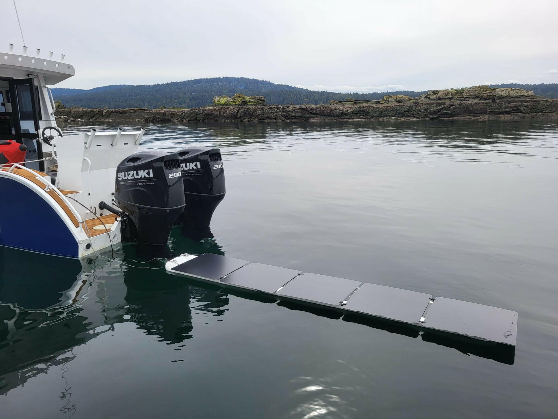 Floating Solar Panels Behind Boat